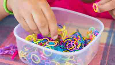 A child with ADHD plays with a basket of fidgets