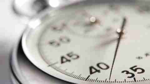 Close up of stopwatch signifying the way boredom stretches time for ADHD people