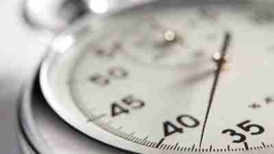 Close up of stopwatch signifying the way boredom stretches time for ADHD people