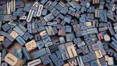 Jumbled letter print stamps used to demonstrate dyslexia and ADHD