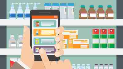 A man dialing a smartphone in front of a medicine cabinet in order to complete his pharmacy, prescription management, adderall shortage