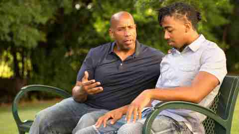 Portrait of an African American father and his son.