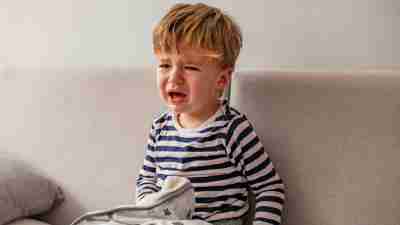 A toddler upset and crying. Extreme emotionality is one sign of ADHD in toddlers.